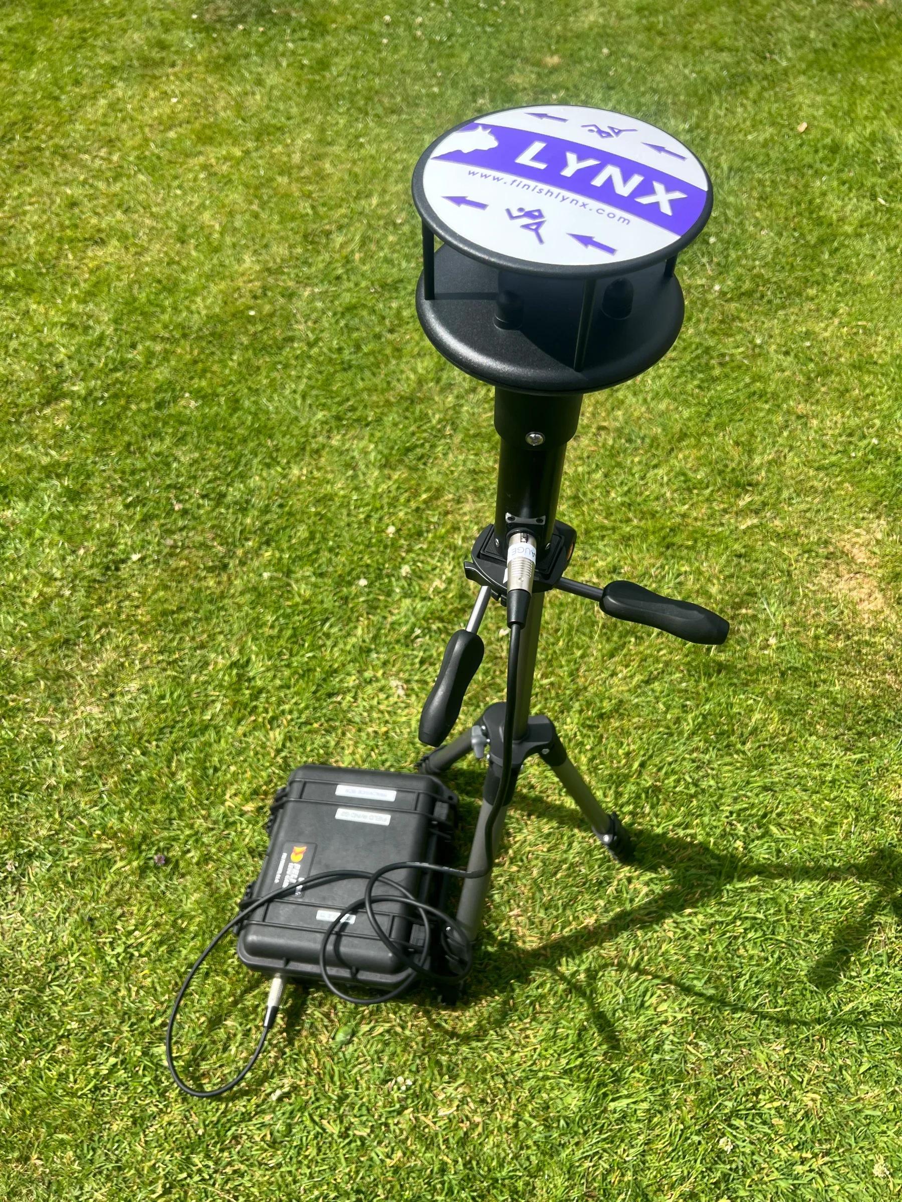 Gill WindSonic wind gauge on a tripod at the track